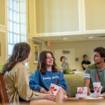 Students eating fast food having a conversation