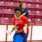 A Cumberlands student spends time with a local child during Shoes 4 the Soul