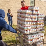 Students help deliver food to a local pantry 