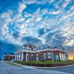 Sun rises over the campus science center. 