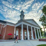 A student walks to class near the Rollins athletics center. 