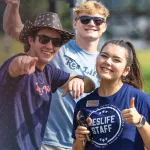 Resident life staff welcome students to campus. 