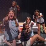 Students act out a scene in the university theatre. 