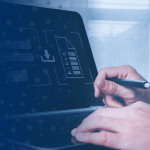 Information Security Specialist Working on Laptop