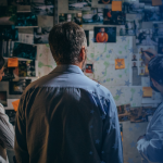 Criminal Justice Employees Working on a Board