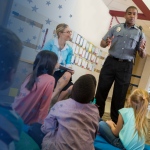 Court Officer Speaking in Classroom