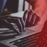 Cybersecurity Personnel on Laptop