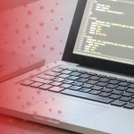 Laptop with HTML on Screen