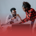 Students and Professor Speaking in Classroom