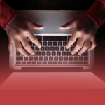 Laptop with Hands Typing