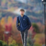 A male Cumberlands student walks across campus on a fall morning. 
