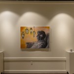 A student painting of an older woman inside the Cumberlands art gallery. 