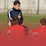 Coach Speaking to Athletes