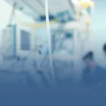 Medical Equipment with Nurses in Background