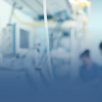 Medical Equipment with Nurses in Background