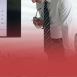 Project Manager Looking Over Desk