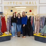 Cumberlands students Ella Edington, Abigail Wynn, and Caitlin Ball pose with prom dresses they have collected to give away to support local high school students. 